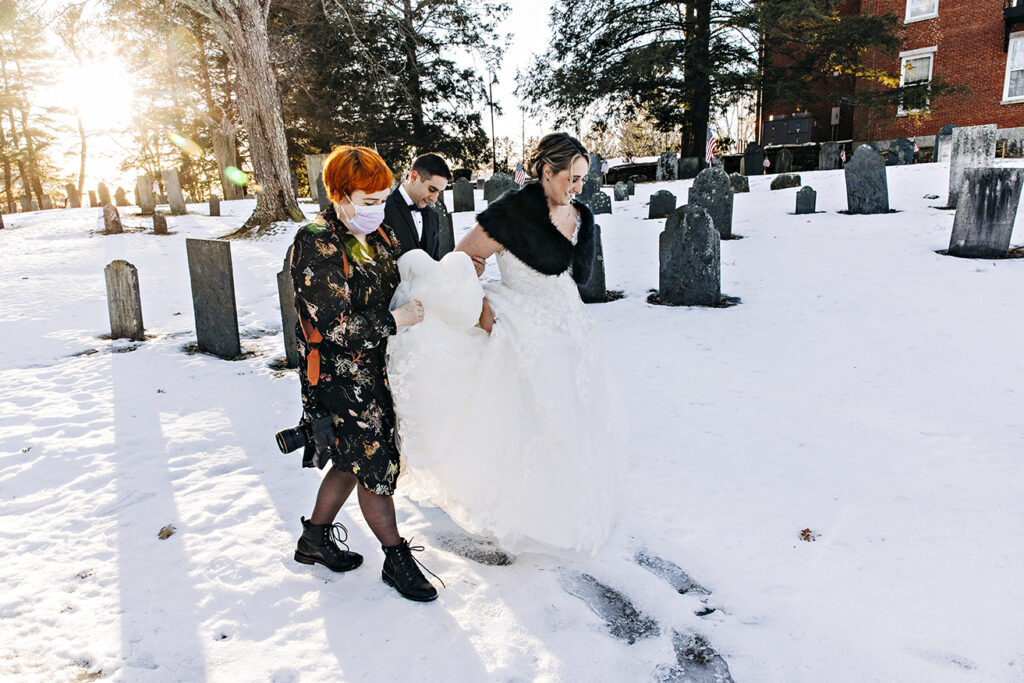 New England wedding photographer walking with bride and groom