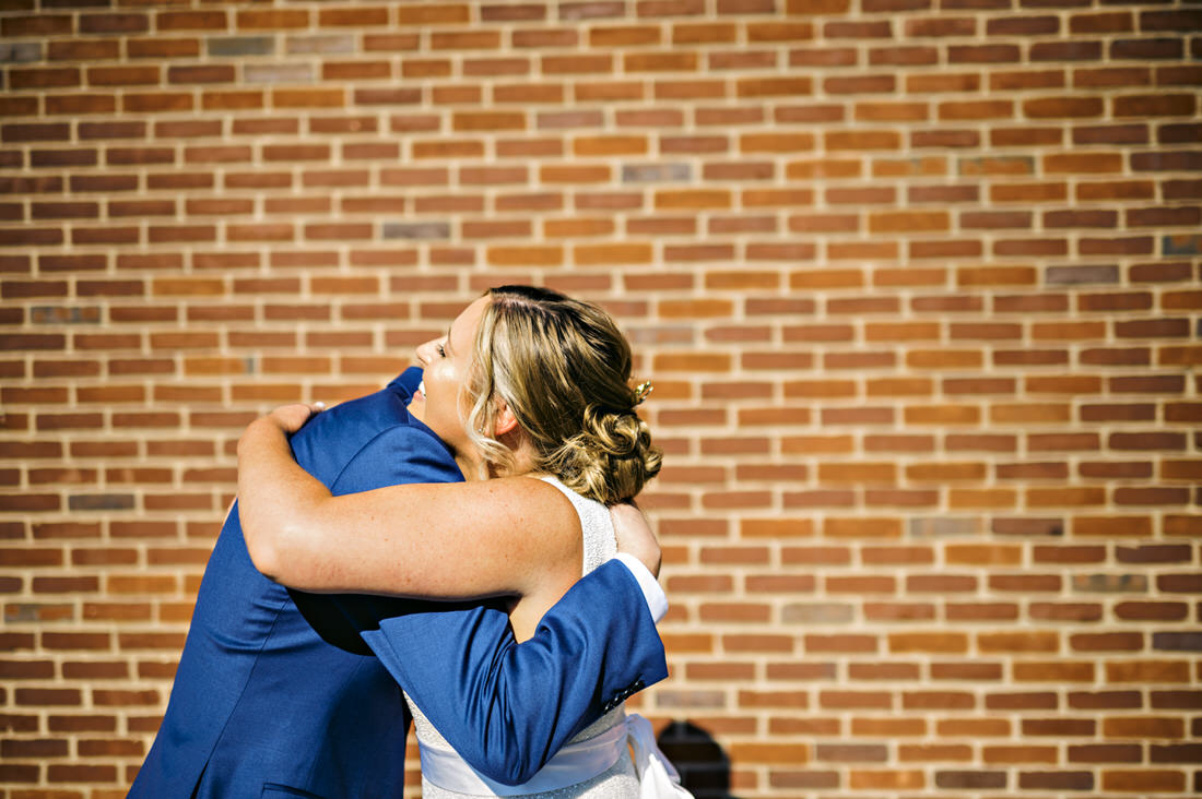 Bride and groom hugging during their first look