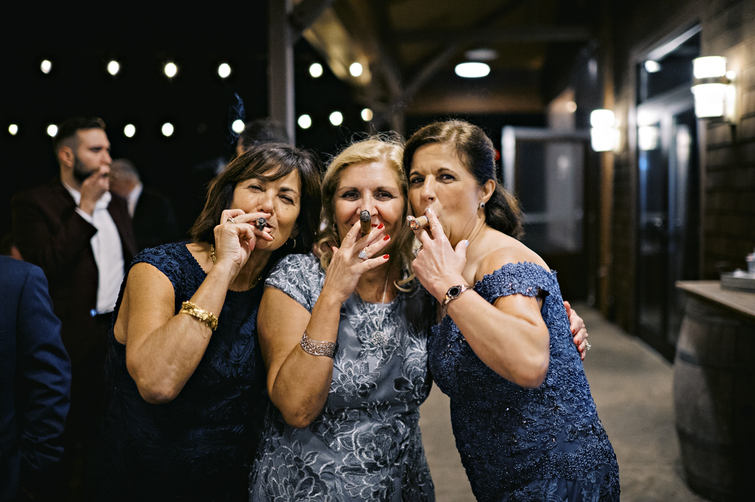 Three women smoking cigars