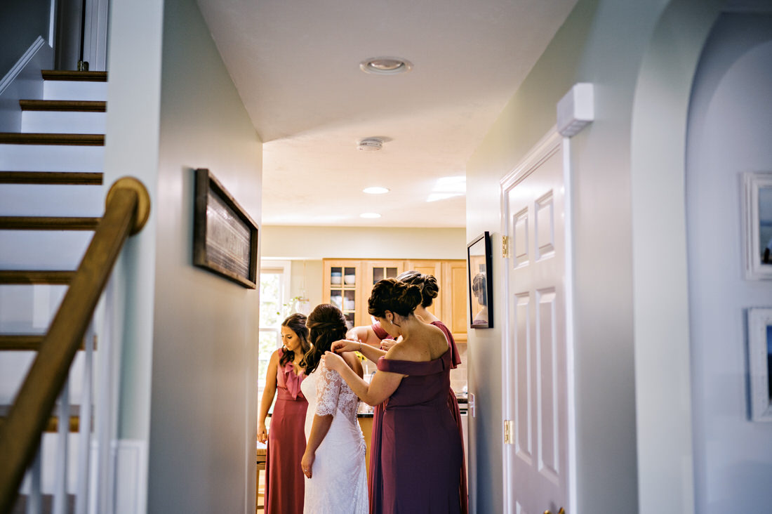 Bride getting ready with her bridesmaids