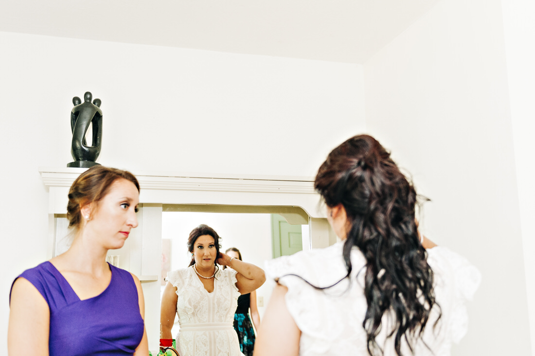 Bride getting ready in bridal suite at Hartmans Herb Farm