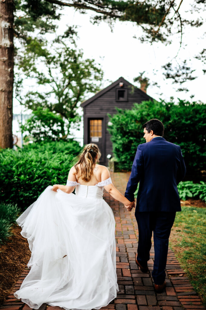 bride-and-groom-holding-hands-house-of-the-seven-gables