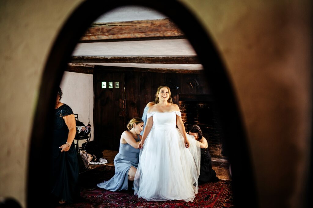 Bride getting ready candid photos at The House of Seven Gables 