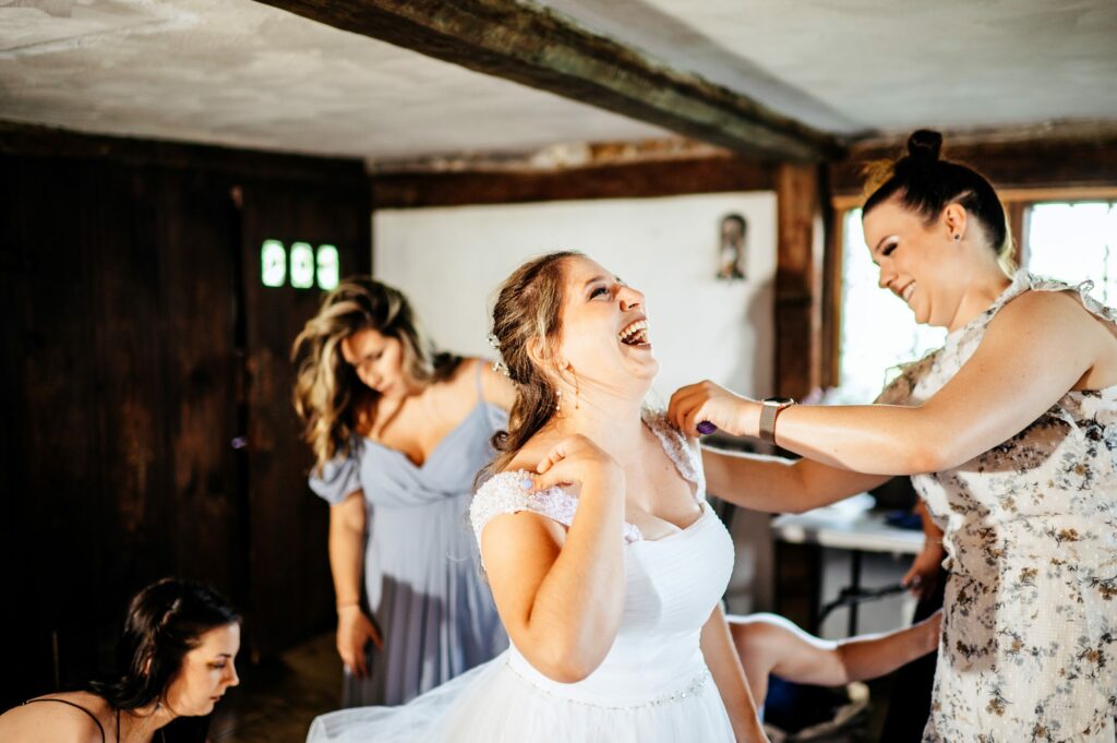 Bride getting ready candid photos at The House of Seven Gables 