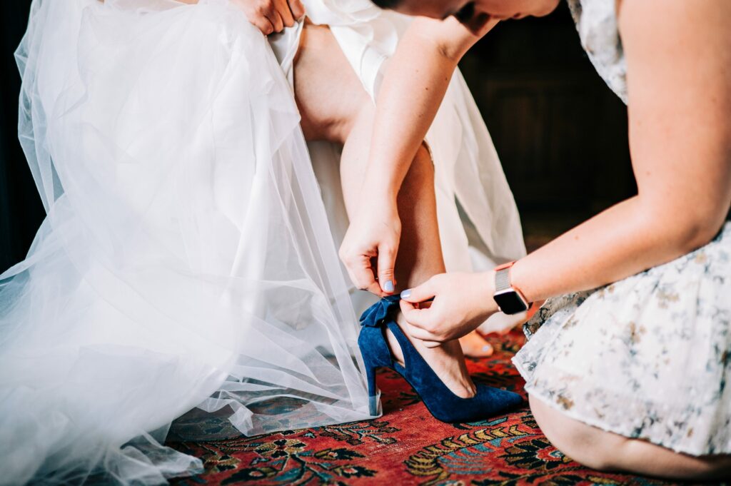 Bride getting ready candid photos at The House of Seven Gables 