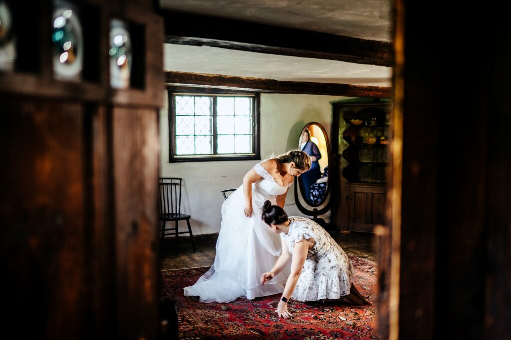 Bride getting ready candid photos at The House of Seven Gables 