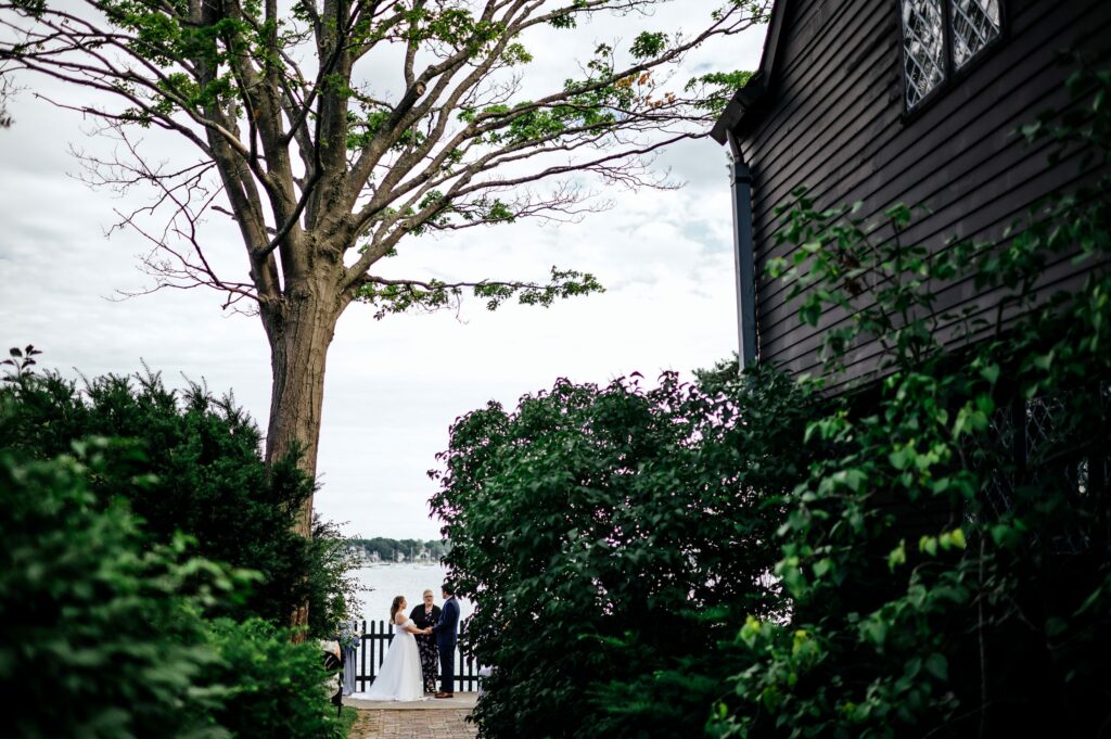 Outdoor waterfront ceremony at The House of Seven Gables 