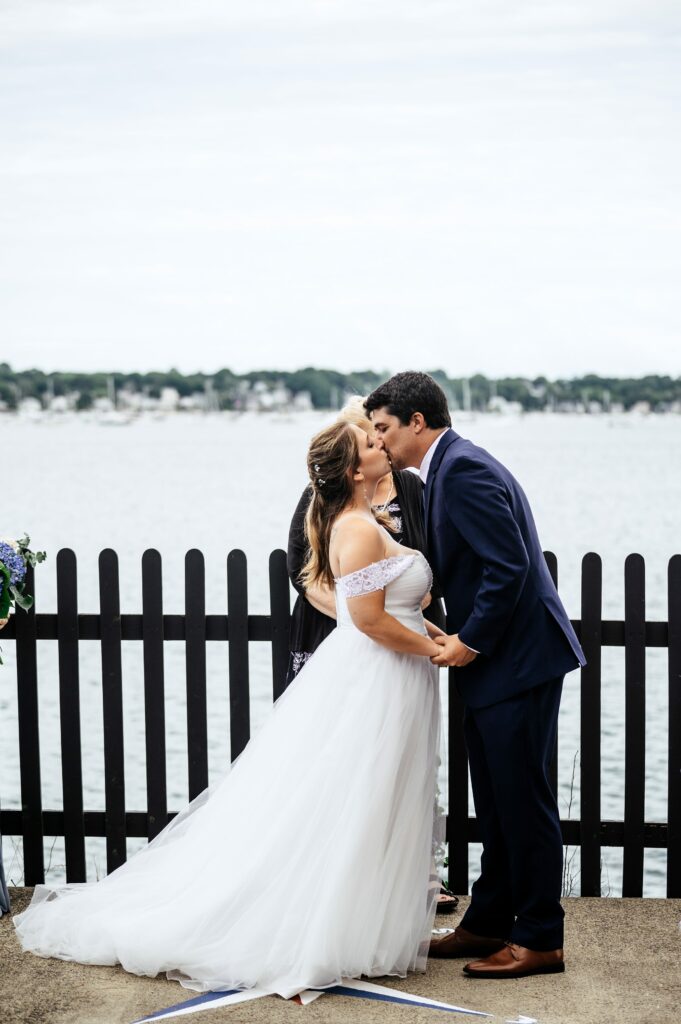 Waterfront wedding ceremony at The House of Seven Gables