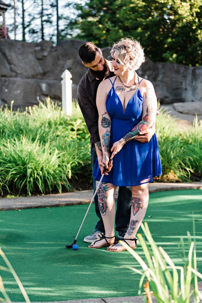 Mini golf engagement photo 