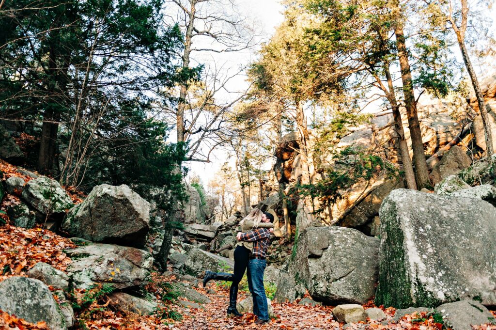 Unique Engagement Session hiking in the woods 