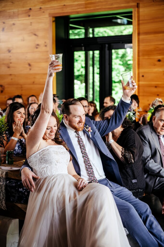 Bride and groom faces during toasts