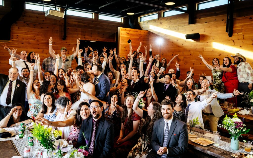 Wedding guests cheering 