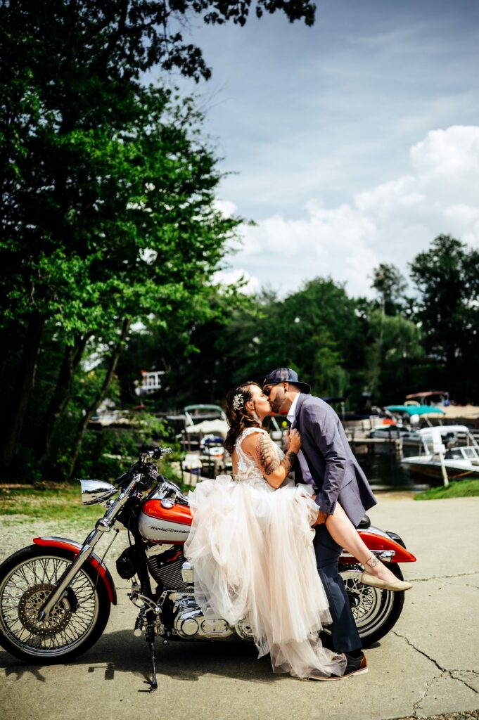 Bride and groom on motorcycle 