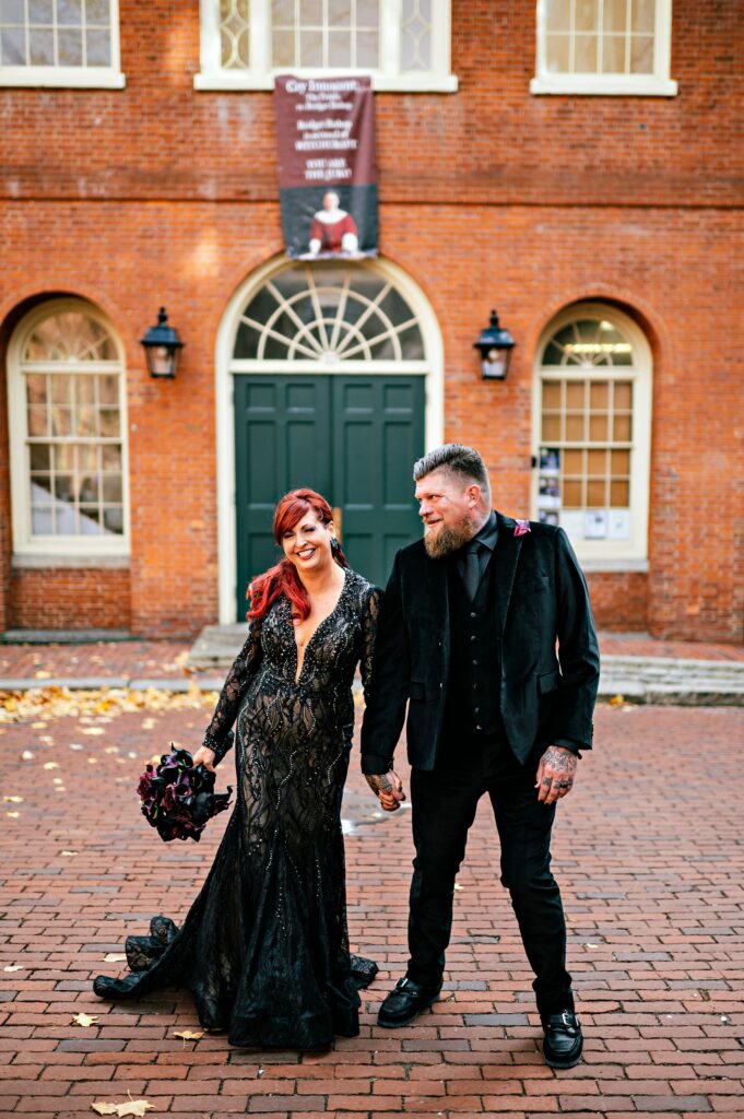 Salem elopement portrait taken downtown with bride and groom wearing all black