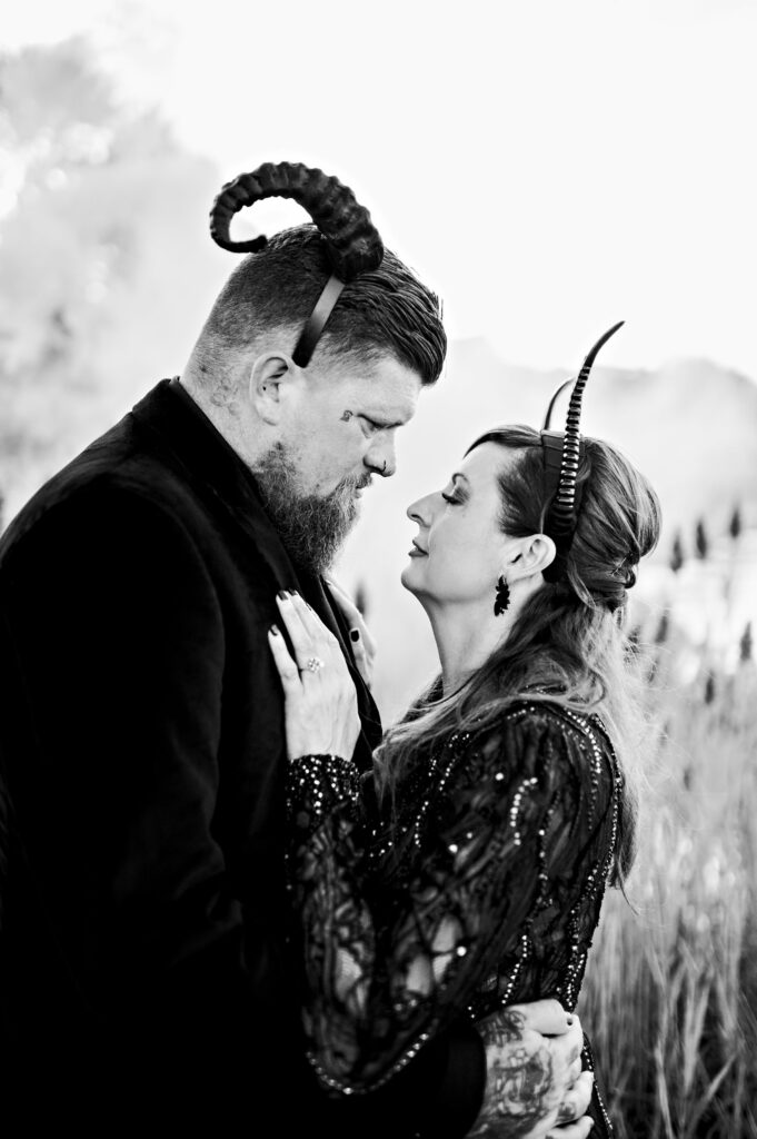 Bride and groom portrait in Salem dressed in all black for Halloween