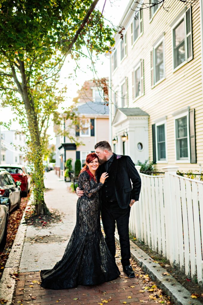 Bride and groom portrait taken on the streets of Salem, MA