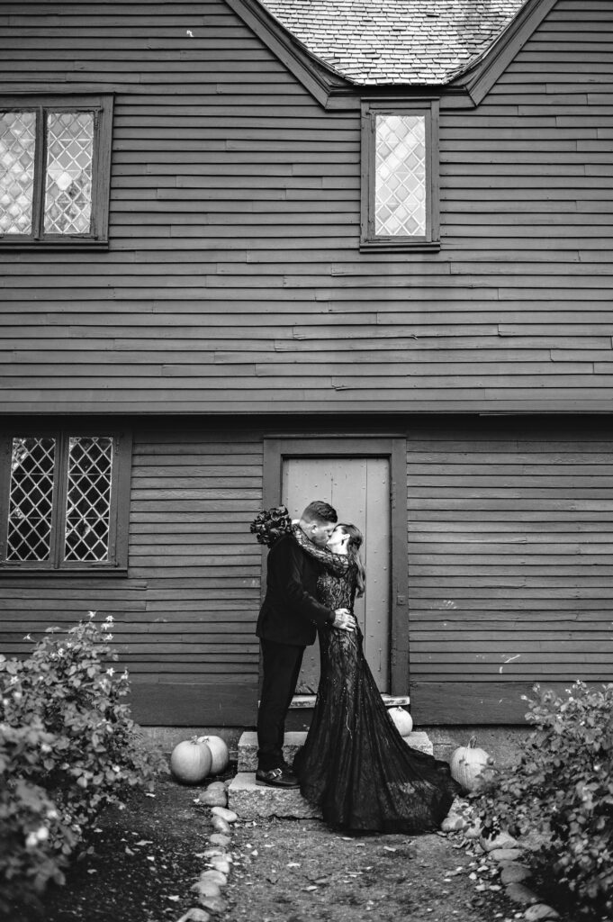 Bride and groom portrait in Salem dressed in all black for Halloween