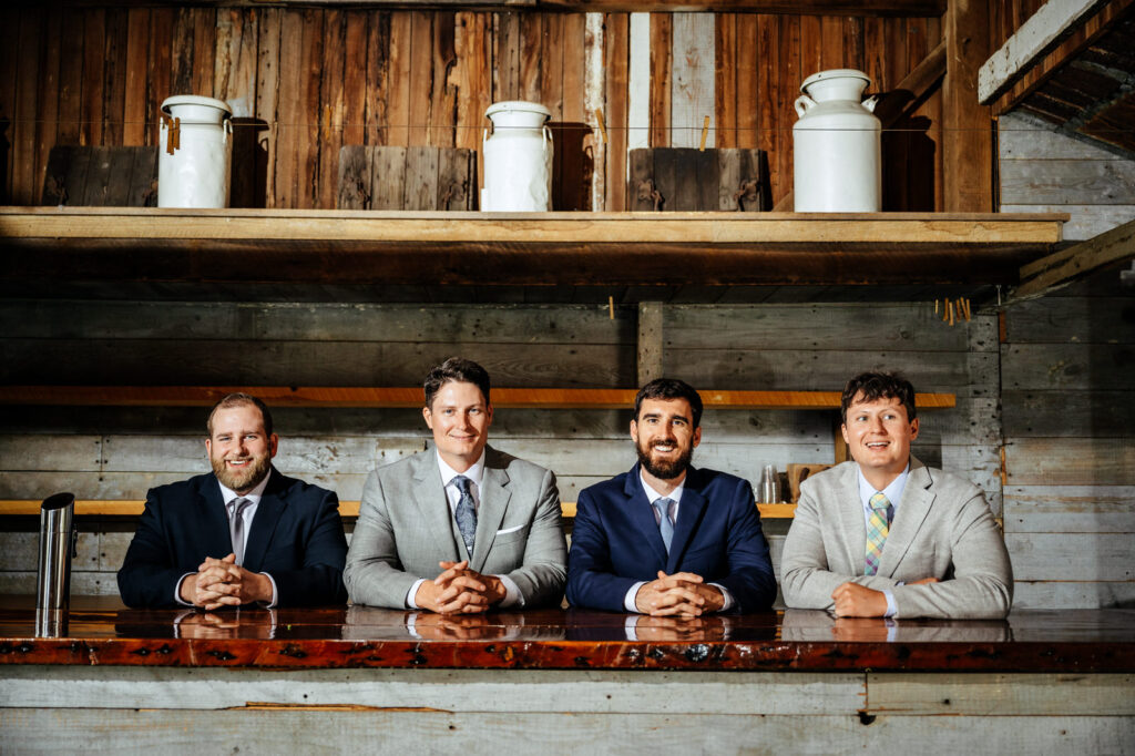 Groom and groomsmen posing