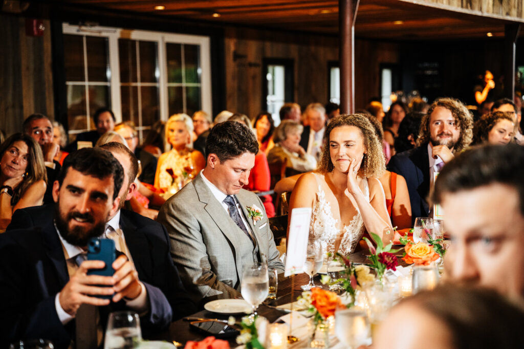 Emotional groom listening to a speech